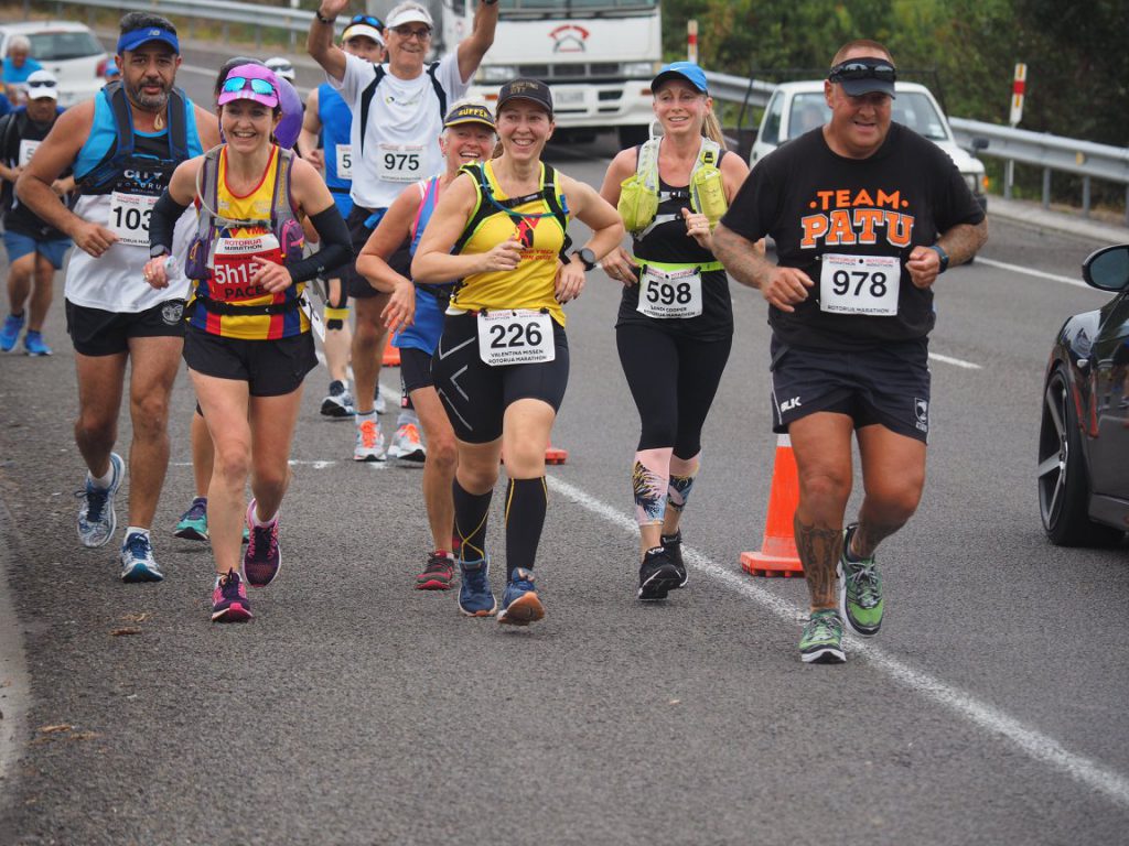 Kiri Price (second from left) running as pacer during her 150th marathon in Rotorua.