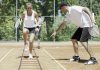 Intensive cardio tennis training - instructor working with girls